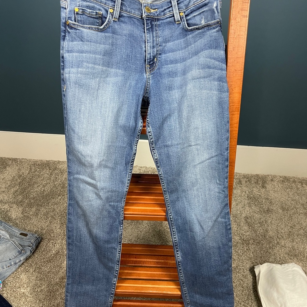 Slightly distressed level 99 jeans.